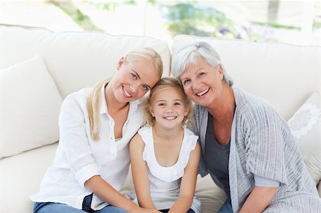 Portrait of a joyful family looking at the camera at home Stock Photo - Budget Royalty-Free & Subscription, Code: 400-04324404