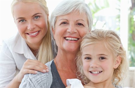 Portrait of a joyful family looking at the camera at home Stock Photo - Budget Royalty-Free & Subscription, Code: 400-04324418