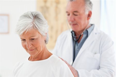 Doctor examining his patient Stock Photo - Budget Royalty-Free & Subscription, Code: 400-04324491