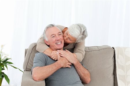 Lovers hugging while they are looking at the camera Stock Photo - Budget Royalty-Free & Subscription, Code: 400-04324517