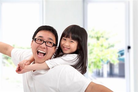 piggyback daughter at beach - Happy father and daughter.Asian family lifestyle Stock Photo - Budget Royalty-Free & Subscription, Code: 400-04324678