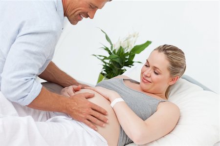 picture of pregnant women in hospital with husband - Adorable couple in a hospital room Stock Photo - Budget Royalty-Free & Subscription, Code: 400-04324696