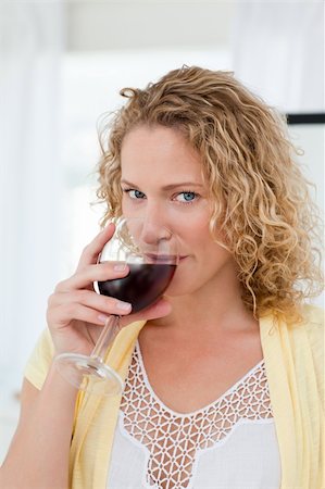 simsearch:400-08021946,k - Pretty woman drinking some wine at home Stock Photo - Budget Royalty-Free & Subscription, Code: 400-04324710