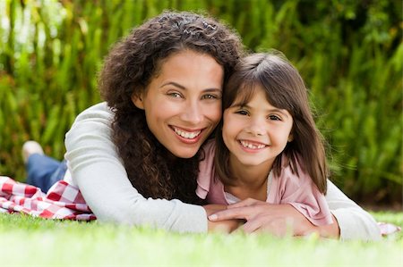 Adorable mother with her daughter in the garden Stock Photo - Budget Royalty-Free & Subscription, Code: 400-04325707