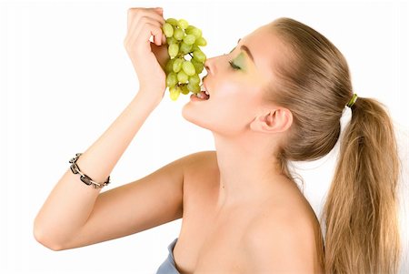 photo of model woman with grapes - Pretty young woman with grape on the white background Stock Photo - Budget Royalty-Free & Subscription, Code: 400-04325769