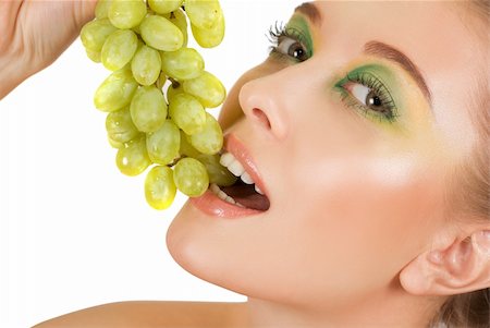 photo of model woman with grapes - Pretty young woman with grape on the white background Stock Photo - Budget Royalty-Free & Subscription, Code: 400-04325772