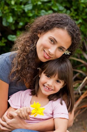 Portrait of a joyful mother with her daughter in the garden Stock Photo - Budget Royalty-Free & Subscription, Code: 400-04326047