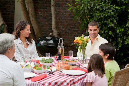 simsearch:400-04327229,k - Happy family eating in the garden Stock Photo - Budget Royalty-Free & Subscription, Code: 400-04326055