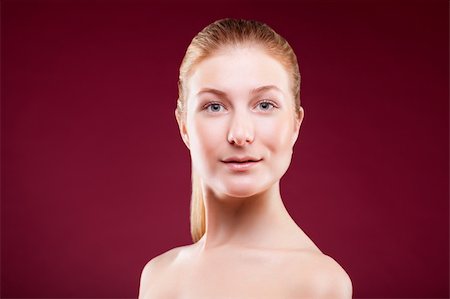 simsearch:400-06101469,k - Portrait of a young lady on red background Stock Photo - Budget Royalty-Free & Subscription, Code: 400-04326255