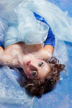 Beautiful girl like Snow White on blue background Stockbilder - Microstock & Abonnement, Bildnummer: 400-04326303