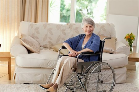 Retired woman in her wheelchair at home Stock Photo - Budget Royalty-Free & Subscription, Code: 400-04326320