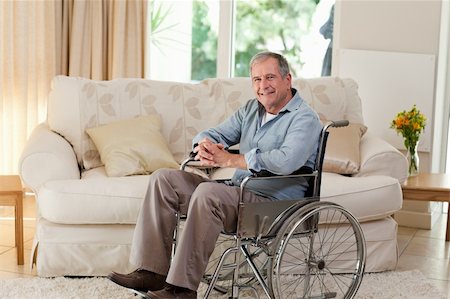 simsearch:400-04327098,k - Senior man in his wheelchair at home Stock Photo - Budget Royalty-Free & Subscription, Code: 400-04326335