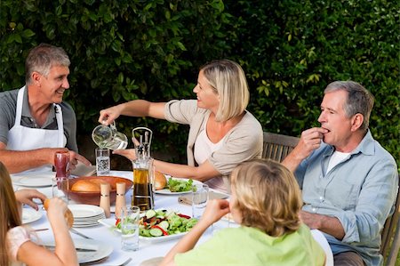 family cheese - Lovely family eating in the garden Stock Photo - Budget Royalty-Free & Subscription, Code: 400-04326357