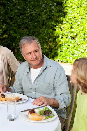 family cheese - Adorable family eating in the garden Stock Photo - Budget Royalty-Free & Subscription, Code: 400-04326360