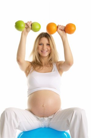 squats dumbbells - pregnant women involved in fitness dumbbells fruit isolated on white Stock Photo - Budget Royalty-Free & Subscription, Code: 400-04326838