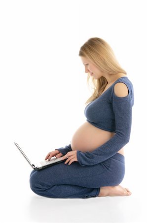 pregnant woman with a laptop sitting on the floor isolated on white Stock Photo - Budget Royalty-Free & Subscription, Code: 400-04326999