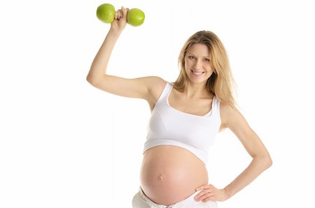 fruit facial - Pregnant woman involved in fitness dumbbells from apples Stock Photo - Budget Royalty-Free & Subscription, Code: 400-04327009