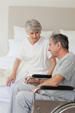 Mature couple in their bedroom Stock Photo - Budget Royalty-Free & Subscription, Code: 400-04327068