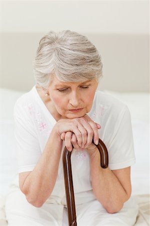 Retired woman with her walking stick at home Stock Photo - Budget Royalty-Free & Subscription, Code: 400-04327083