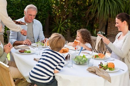 family cheese - Family eating in the garden Stock Photo - Budget Royalty-Free & Subscription, Code: 400-04327231