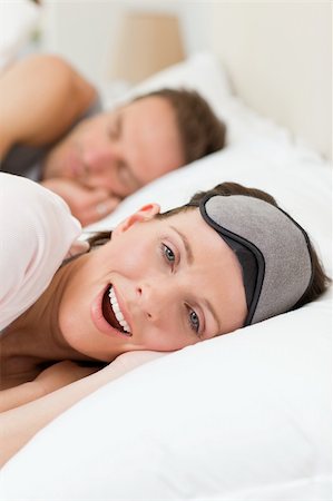 Lovely couple lying down in their bed Stock Photo - Budget Royalty-Free & Subscription, Code: 400-04327433