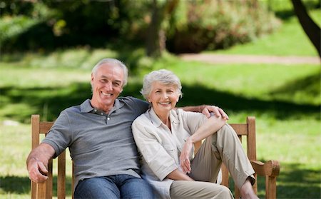 Senior couple sitting on a bench Stock Photo - Budget Royalty-Free & Subscription, Code: 400-04327559