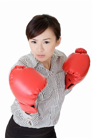 Young business woman fighting, closeup portrait on white background. Stock Photo - Budget Royalty-Free & Subscription, Code: 400-04327617