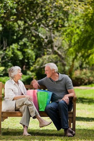 Retired couple with shopping bags Stock Photo - Budget Royalty-Free & Subscription, Code: 400-04327778