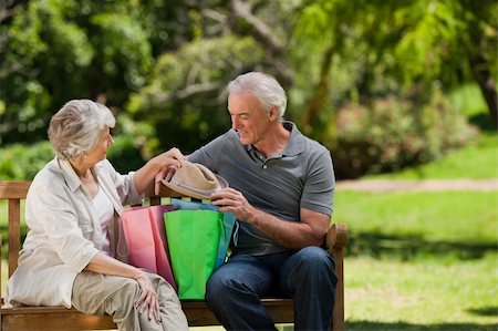 Retired couple with shopping bags Stock Photo - Budget Royalty-Free & Subscription, Code: 400-04327780