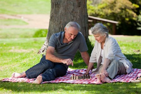 simsearch:400-05711437,k - Mature couple  picnicking in the garden Stock Photo - Budget Royalty-Free & Subscription, Code: 400-04327796