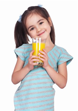fotostok_pdv (artist) - Portrait of happy little girl drinking orange juice Foto de stock - Royalty-Free Super Valor e Assinatura, Número: 400-04327831