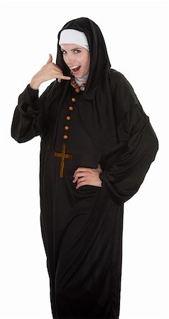 Young nun pretending to talk on a telephone Stock Photo - Budget Royalty-Free & Subscription, Code: 400-04328081