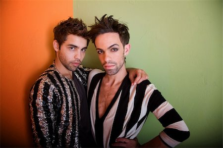 Attractive gay couple in black and white clothing Foto de stock - Super Valor sin royalties y Suscripción, Código: 400-04328196