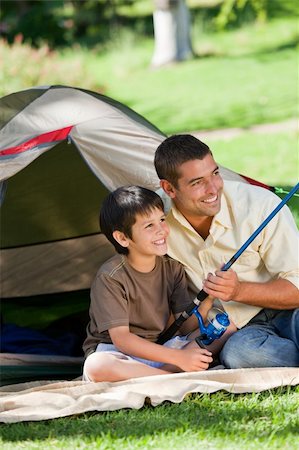 father son camping woods - Son fishing with his father Stock Photo - Budget Royalty-Free & Subscription, Code: 400-04328349