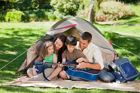 Joyful family camping Stock Photo - Budget Royalty-Free & Subscription, Code: 400-04328340