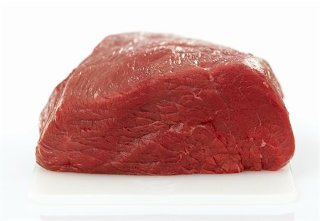 simsearch:400-04328883,k - fresh raw meat on white cutting board Foto de stock - Super Valor sin royalties y Suscripción, Código: 400-04328884