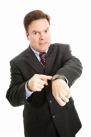 simsearch:400-05347520,k - Businessman impatiently pointing to his watch.  Isolated on white. Photographie de stock - Aubaine LD & Abonnement, Code: 400-04328915