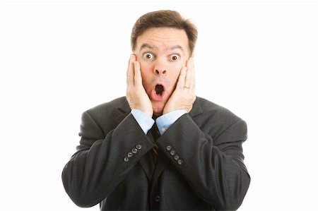 simsearch:400-05347520,k - Shocked businessman isolated on a white background. Photographie de stock - Aubaine LD & Abonnement, Code: 400-04328920