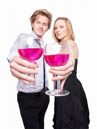 Young couple toasting with pink drink. Selective Focus. Studio photo, isolated. Stock Photo - Budget Royalty-Free & Subscription, Code: 400-04328934
