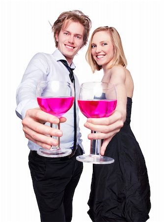 Young couple toasting with pink drink. Selective Focus. Studio photo, isolated. Stock Photo - Budget Royalty-Free & Subscription, Code: 400-04328935