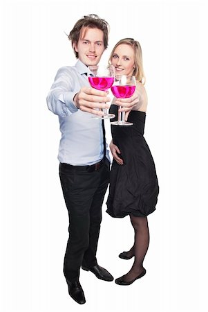 Young couple toasting with pink drink. Two people drinking. Studio photo, isolated. Stock Photo - Budget Royalty-Free & Subscription, Code: 400-04328937