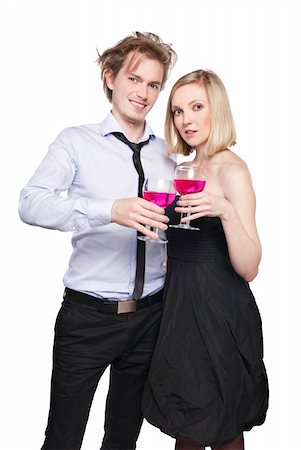 Young couple toasting with pink drink. Two people drinking. Studio photo, isolated. Stock Photo - Budget Royalty-Free & Subscription, Code: 400-04328932