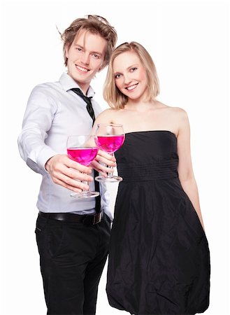 Young couple toasting with pink drink. Two people drinking. Studio photo, isolated. Stock Photo - Budget Royalty-Free & Subscription, Code: 400-04328933