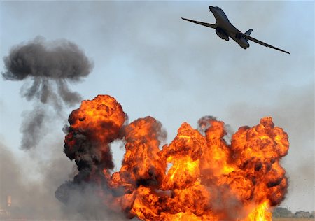 Heavy bomber dropping bombs on ground targets Stock Photo - Budget Royalty-Free & Subscription, Code: 400-04329116