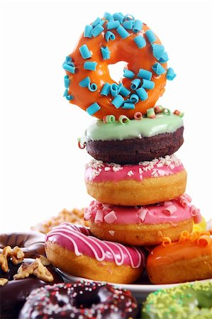 simsearch:400-04835290,k - Colorful and tasty donuts on white background Stock Photo - Budget Royalty-Free & Subscription, Code: 400-04329284