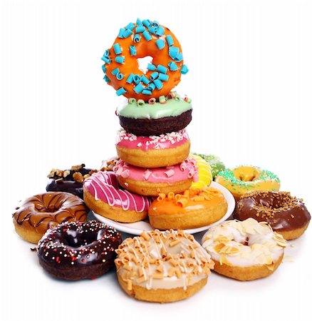 simsearch:400-04835290,k - Colorful and tasty donuts on white background Stock Photo - Budget Royalty-Free & Subscription, Code: 400-04329282