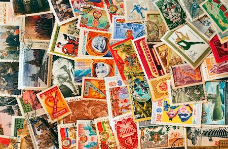 Pile of used post stamps from Soviet Union - Lenin, astronauts, revolution, sociaslism, etc... Stockbilder - Microstock & Abonnement, Bildnummer: 400-04329556