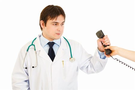simsearch:400-07334526,k - Serious medical doctor taking phone from secretary  isolated on white Stock Photo - Budget Royalty-Free & Subscription, Code: 400-04329654