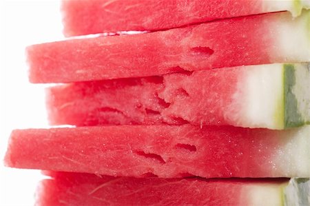 red water melon - Five pieces of watermelon isolated over white. Photographie de stock - Aubaine LD & Abonnement, Code: 400-04329749