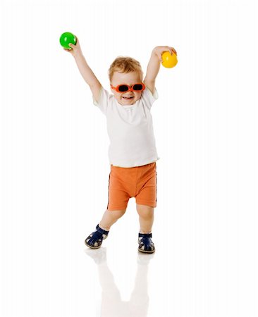 toddler boy playing with toys  isolated on white Stockbilder - Microstock & Abonnement, Bildnummer: 400-04329762